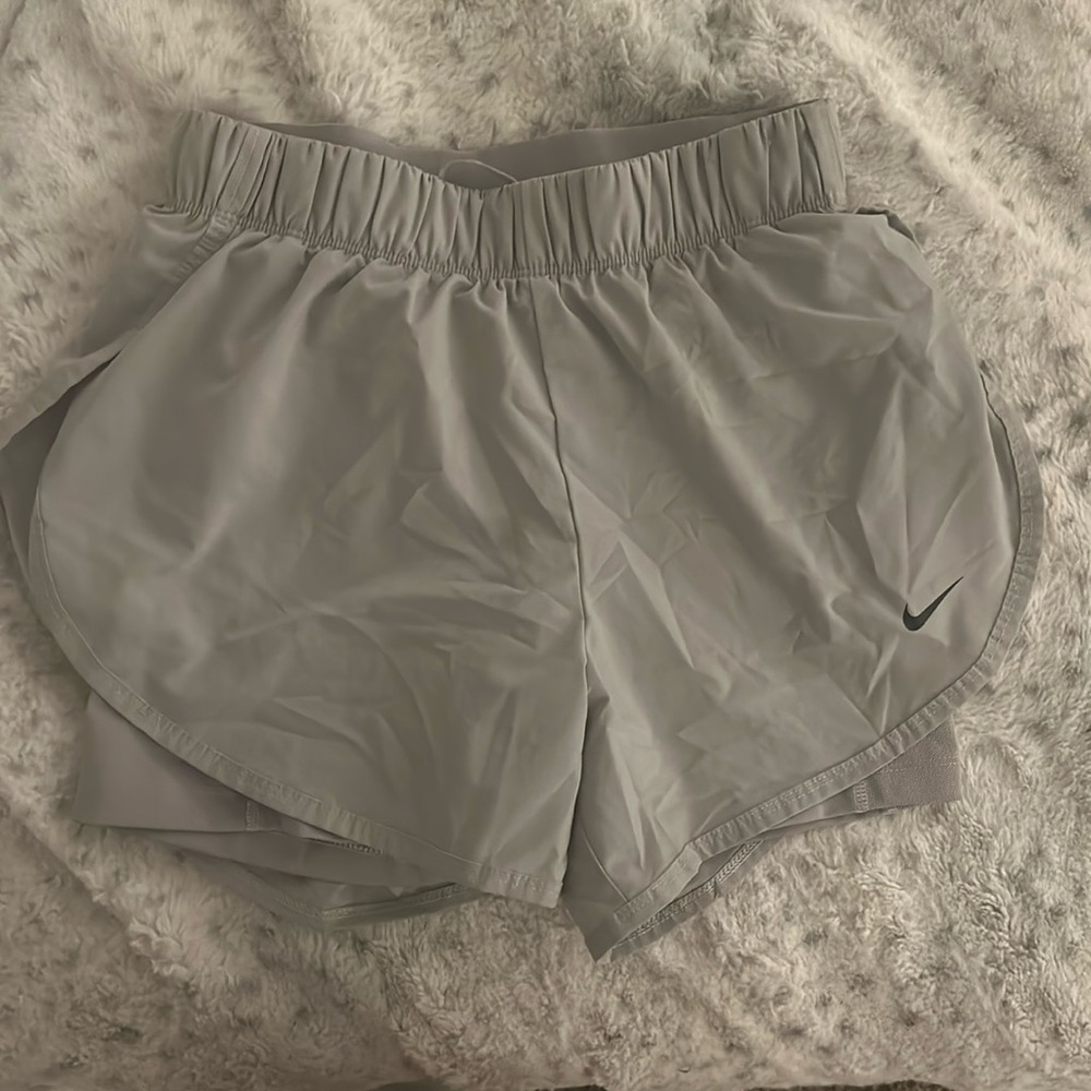 grey nike shorts with built in spandex. worn few times in great condition